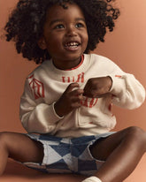 Toddler Otter Sweatshirtâ„¢ with Pockets in Big Top Print - Cream