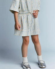 Toddler Girl Flowy Romper in Otter Avenue Print - Cream