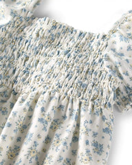 Baby Girl Smocked Romper Made with Organic Cotton in Spring Bloom
