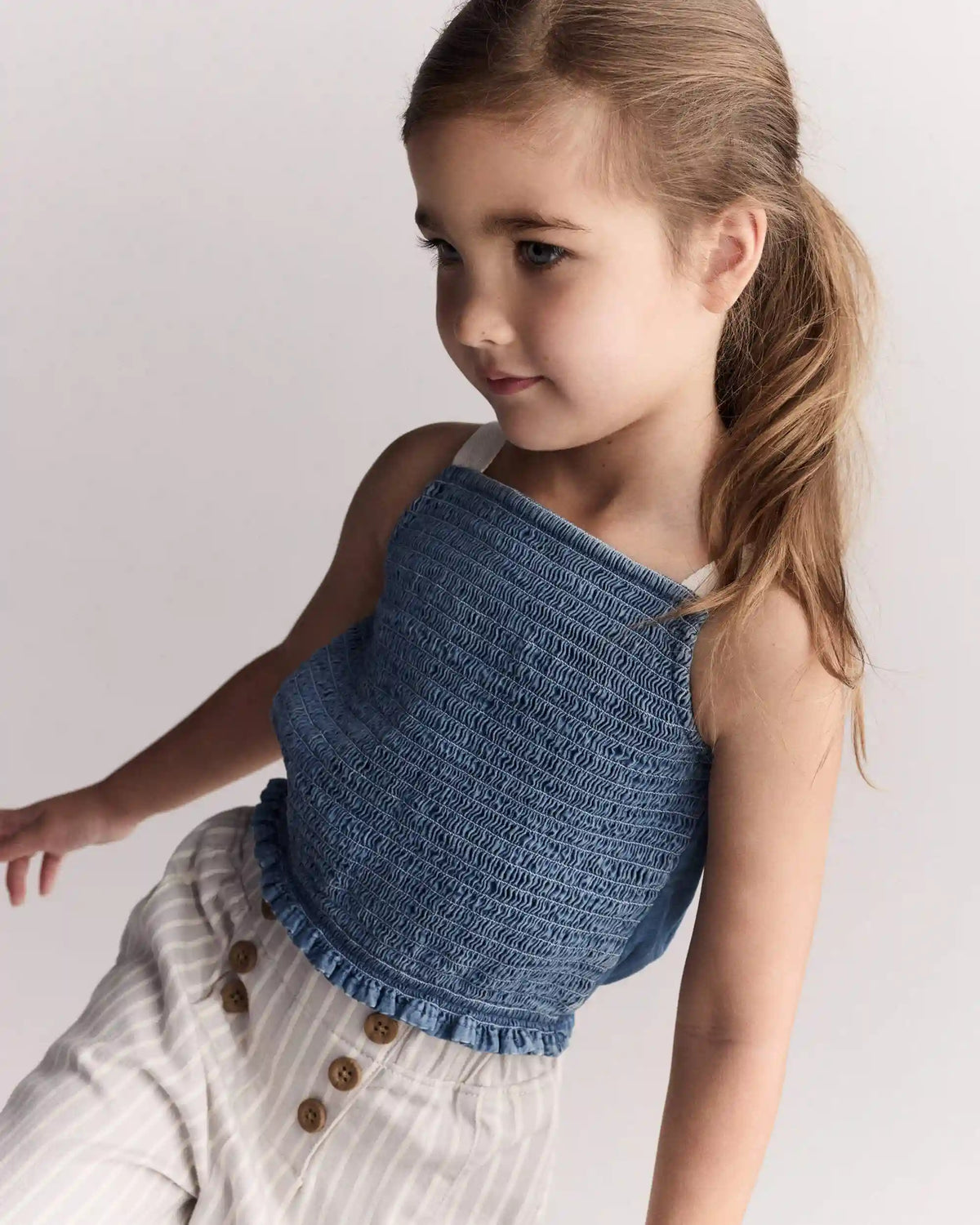 Toddler Girl Smocked Peplum Top in Chambray