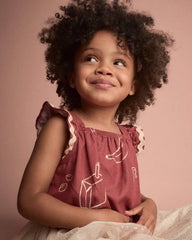 Toddler Girl Ruffle Peplum Top in Snack Print - Red