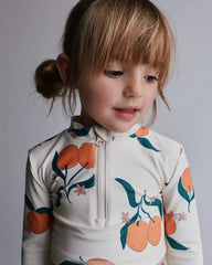 Toddler Girl Half-Zip Long-Sleeve Rashguard Set in Clementine Grove Print - Cream