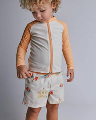 Toddler Boy Swim Trunks in Sandcastle Print - Cream