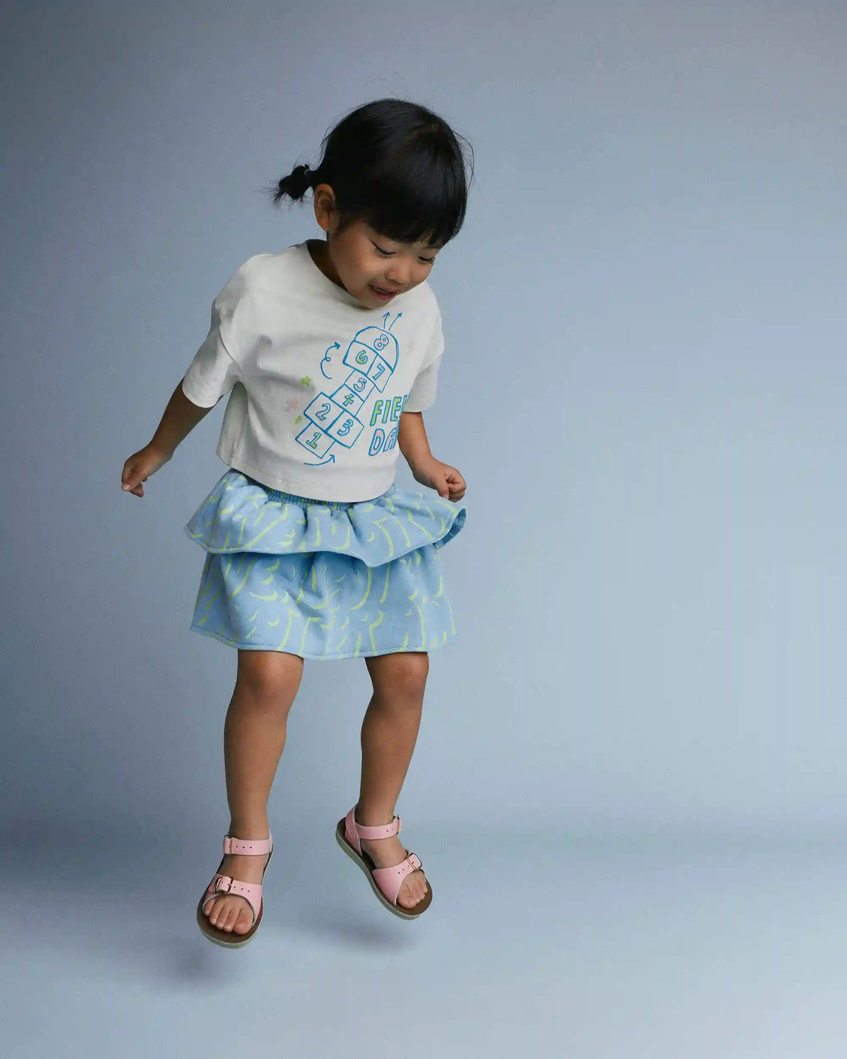 Toddler Girl 'Field Day' Breezy Top in Hopscotch Print - Cream