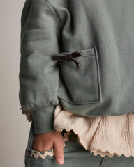 Toddler Girl Otter Sweatshirt™ with Bow Pockets - Olive